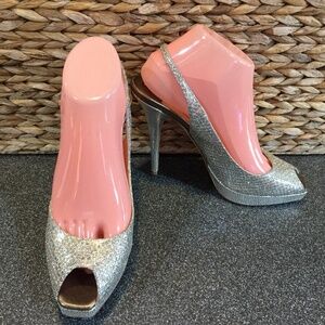 Jimmy Choo Silver “Nova” Peep Toe Heels
